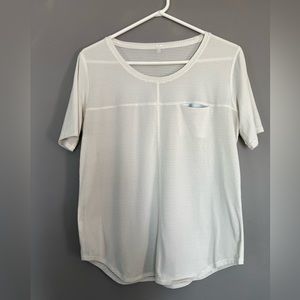 Lululemon shirt; cream color with light stripes, size medium.